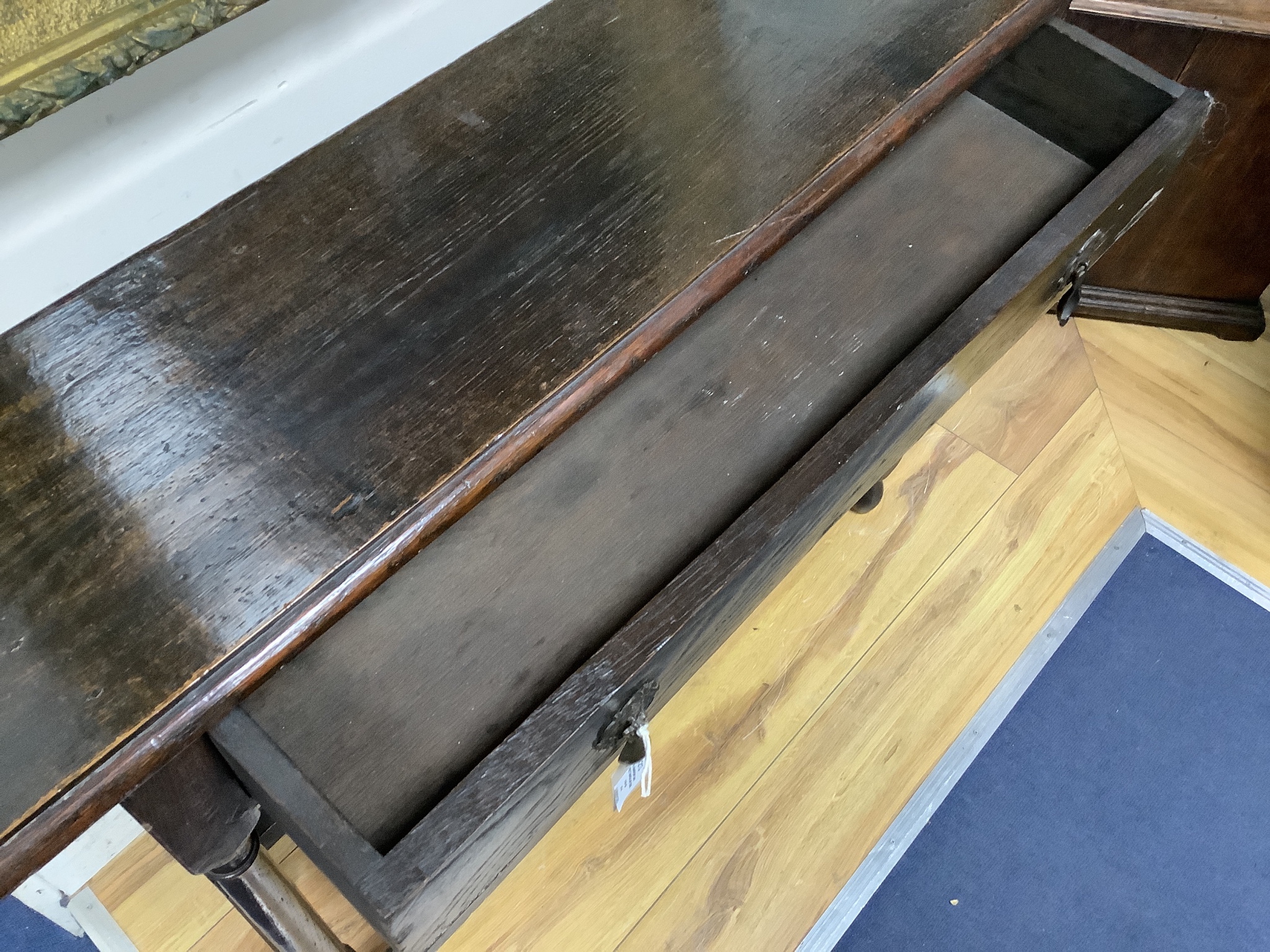 A narrow oak rectangular side table